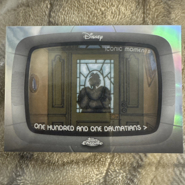 2026 Topps Chrome Disney #IM-2 Cruella's Entrance Iconic Moments
