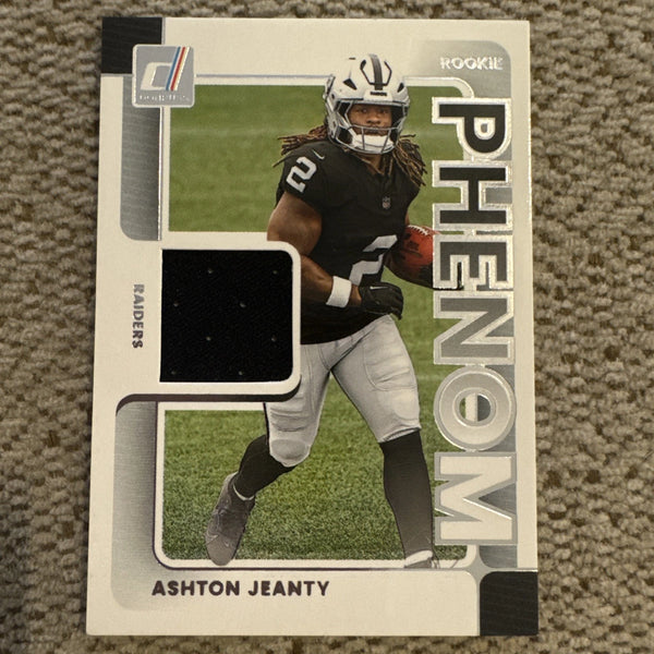 2025 Panini Donruss - Rookie Phenom Jerseys Ashton Jeanty #RPJ-AJY (MEM, RC)