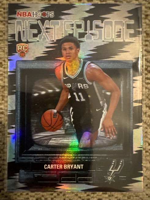 Carter Bryant 2025-26 Topps NBA Hoops RC Next Episode Rainbow #NE-14 Spurs