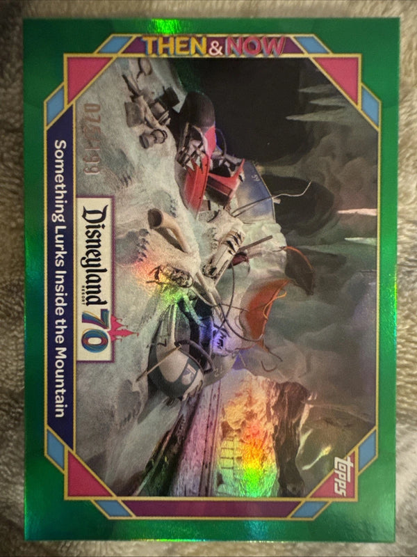 2025 Topps Disneyland 70th #40 Something Lurks Inside The Mountain Green /199