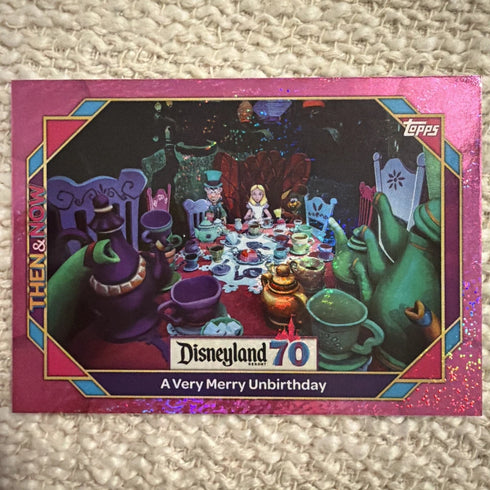 2025 Topps Disneyland 70th Anniversary A Very Merry Unbirthday Pink Shimmer #45