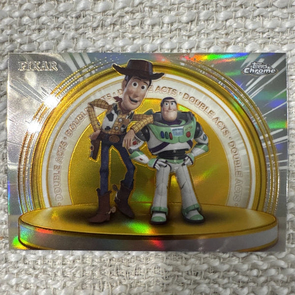 Woody Buzz Lightyear 2025 Topps Disney Pixar Gold Double Acts Insert #DA-1