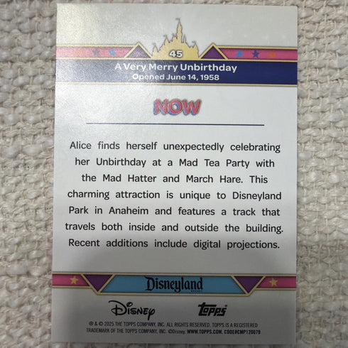 A Very Merry Unbirthday Pink Glitter 2025 Topps Disneyland 70th #45