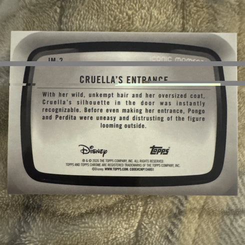 2026 Topps Chrome Disney #IM-2 Cruella's Entrance Iconic Moments