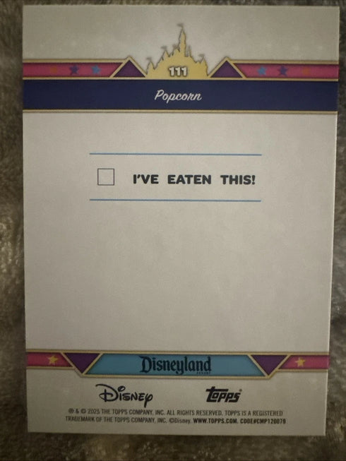 2025 Topps Disneyland 70th Pink Shimmer #111 Snack Time Caramel & Kettle Corn