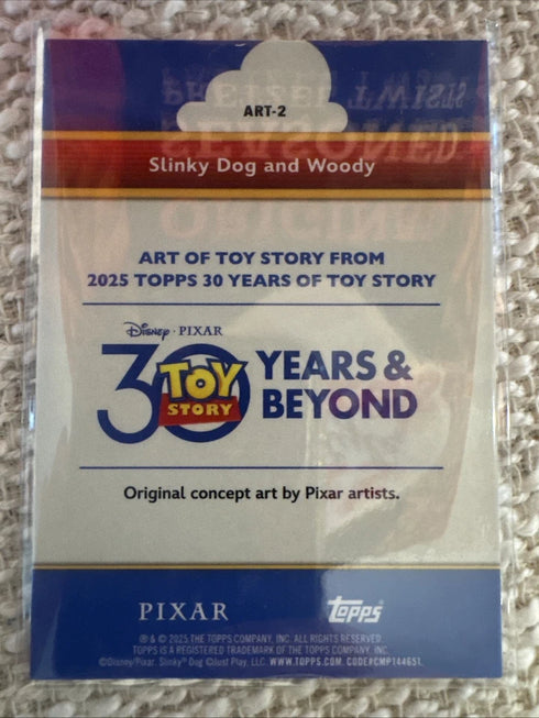 2025 Topps 30 Years Of Toy Story Art of Toy Story Slinky Dog & Woody