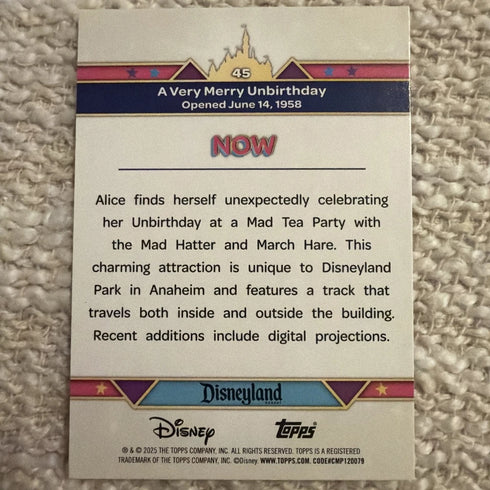 2025 Topps Disneyland 70th Anniversary A Very Merry Unbirthday Pink Shimmer #45